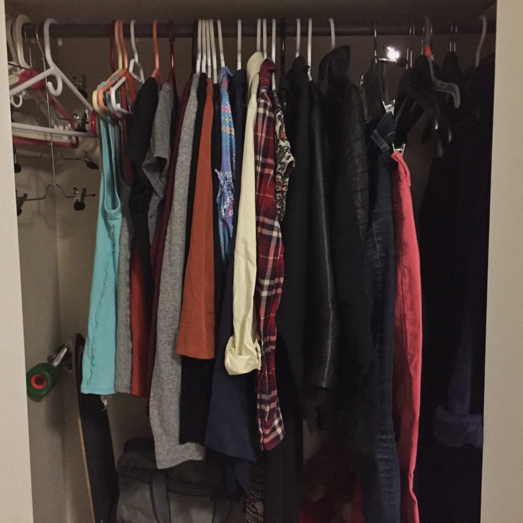 clothing hung in a closet after a closet cleanout