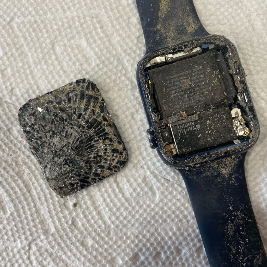 Low-waste living means tackling e-waste. This photo shows a smashed Apple Watch that was unrecoverable.